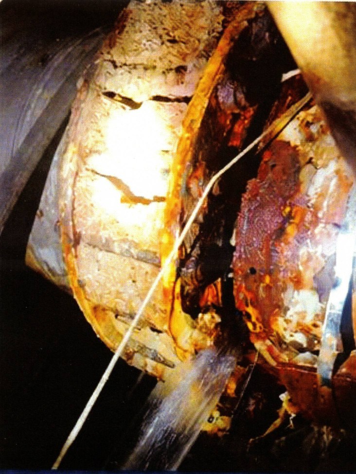 Corroded ballast pipe section before repair